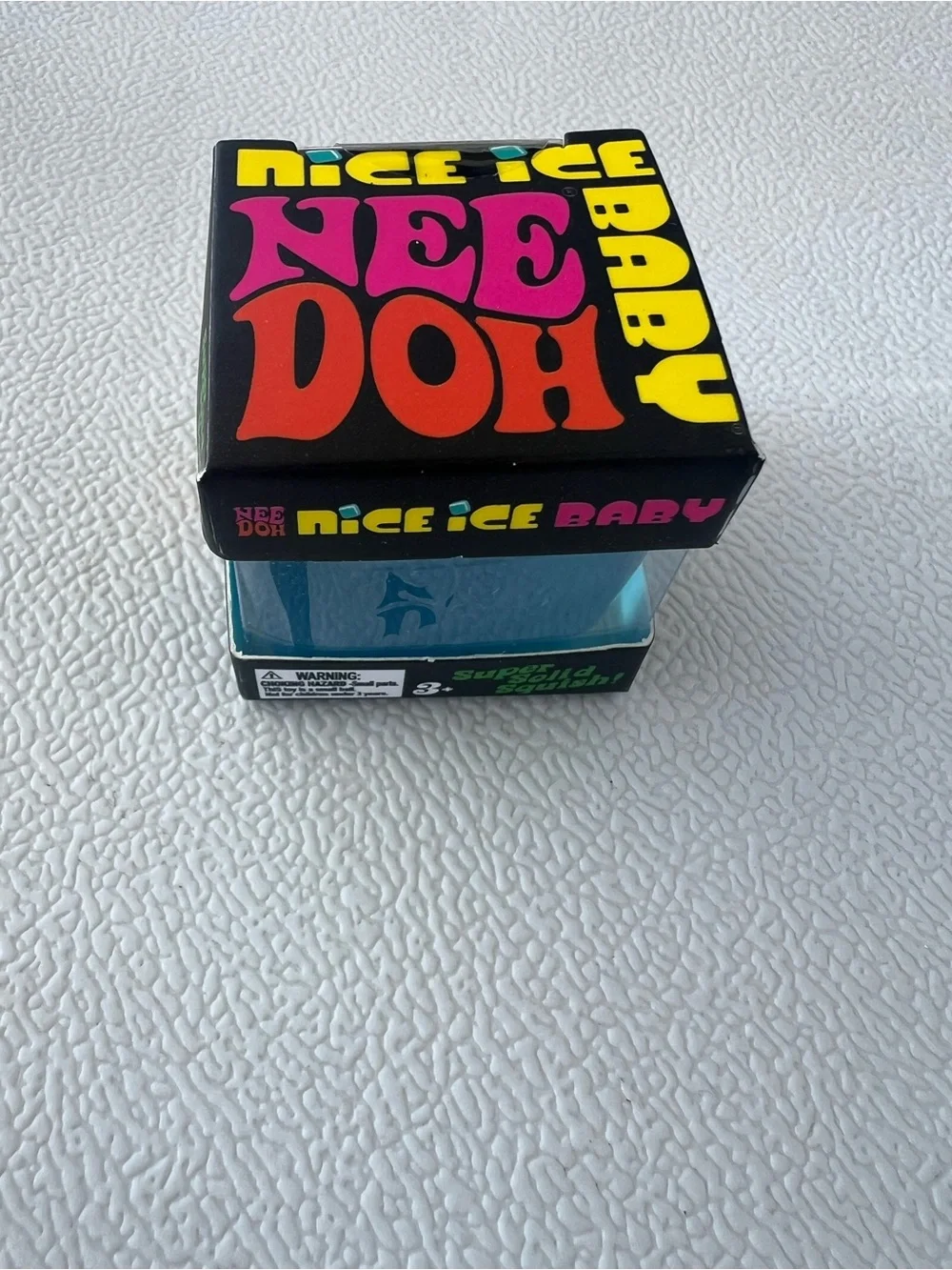 NeeDoh Mini’s groovy glob, ice baby, Dumpling and Mini Cheese Stress Toys